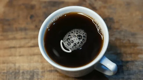 Freshly poured Ethiopia Yirgacheffe coffee in a white cup