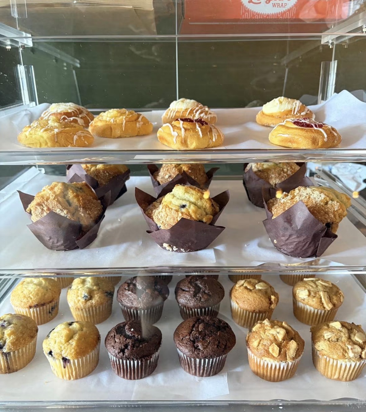 Case of muffins and pastries